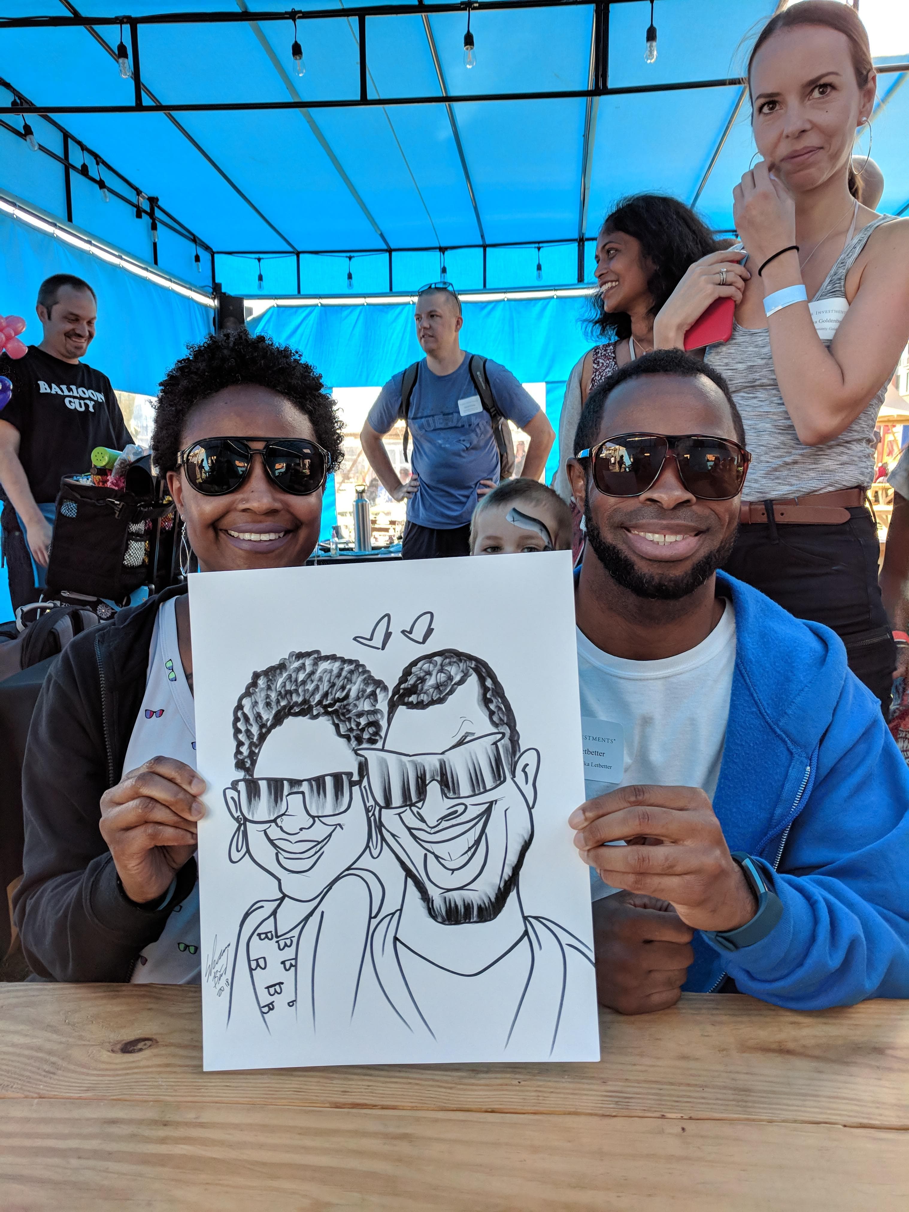 Couple in sunglasses with matching caricature