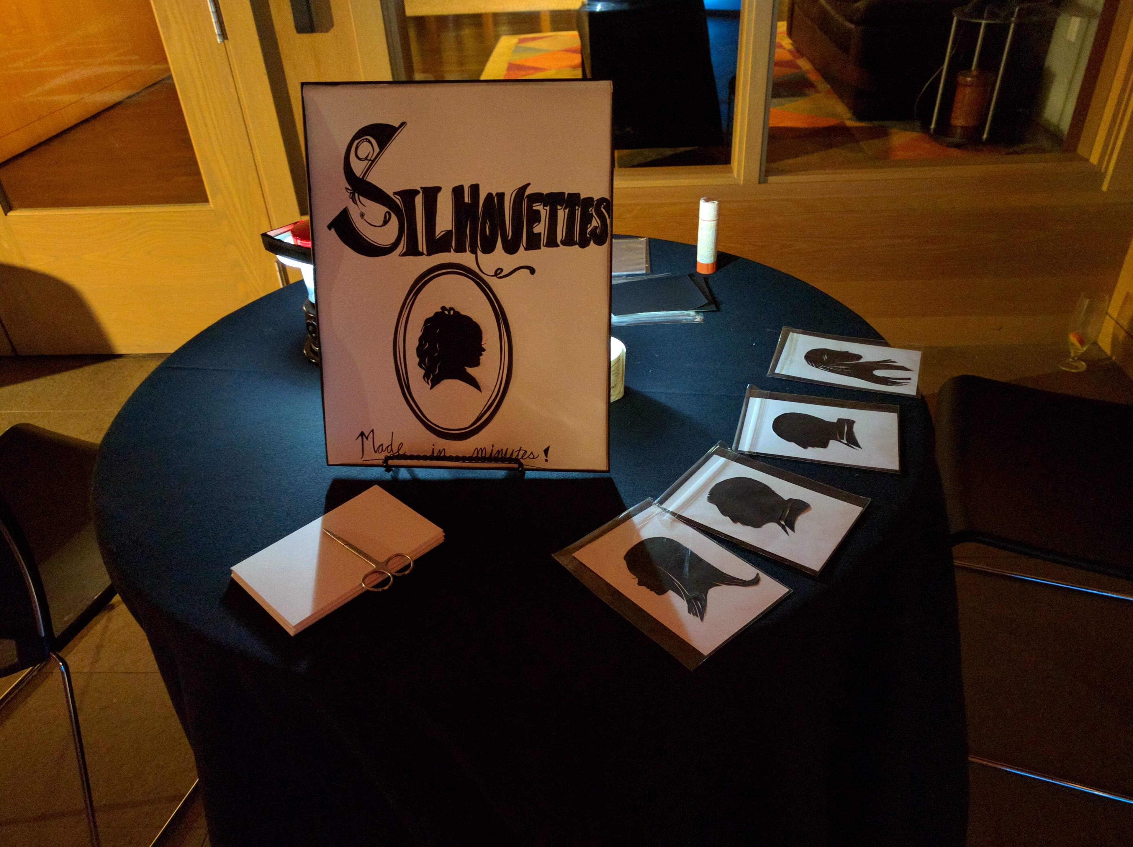 Silhouette cutting station with samples on display